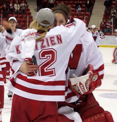 Heidi Kletzien offers a hug after Wisconsin's championship win. / Matt Rennell