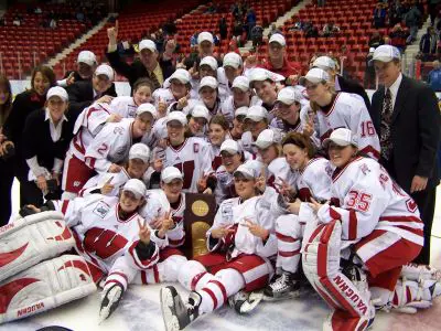 The Wisconsin team poses with the trophy. / Matt Rennell