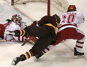 Minnesota's Bobbi Ross scores late in the first period to tie the score at one. / Ryan Coleman