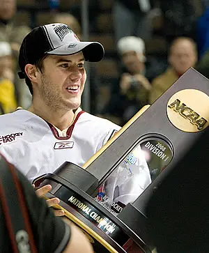 Boston College's Dan Bertram with the championship trophy (photo: Melissa Wade).