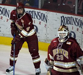 Chris Butler (left, alongside Peter Mannino) in a familiar position -- taking care of defense (photo: Candace Horgan).