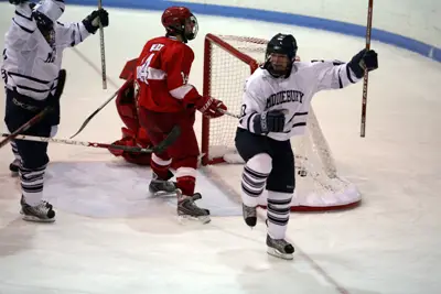 Senior Mickey Gilchrist looks to celebrate a fourth straight NESCAC title (photo by Albert Bitici)