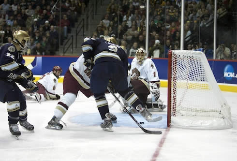 A puck off the skate of Notre Dame's Kyle Lawson eventually turned into a no-goal for the Irish (photo: Jim Rosvold).