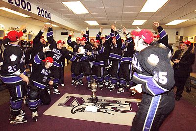 Niagara celebrates its CHA championship in the locker room (photo: Niagara athletic communications).