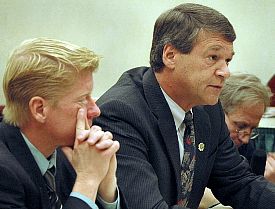 North Dakota Attorney General Wayne Stenehjem (right) outlines the details of a settlement with the NCAA during a meeting with the State Board of Higher Education (photo: Patrick C. Miller).