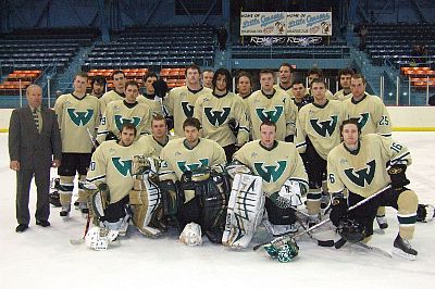 Wayne State hockey gathers on the ice after Saturday's contest.