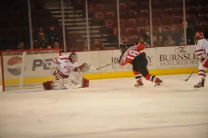 Alex Angers-Goulet of RPI scores against BU. Photo by: Candace Horgan