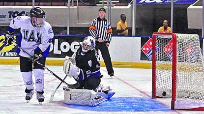 Andrew Coburn of Alabama-Huntsville puts a shot past Niagara netminder Juliano Pagliero (photo: Doug Eagan).