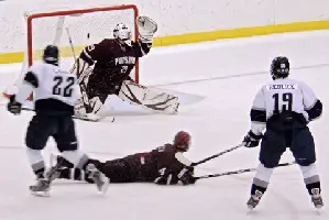 Geneseo's senior forward Kevin Galan scores the second of his two goals against Potsdam. Photo: Angelo Lisuzzo.