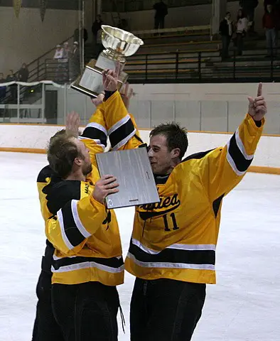 Gusties captains accept the MIAC championship trophy (photo: Matthew Webb).