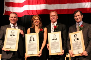 Brett Hull, Cammi Granato, Brian Leetch and Mike Richter hold their plaques after their induction into the U.S. Hockey Hall of Fame (photo: Candace Horgan).