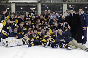 Neumann celebrates their title (photo: Angelo Lisuzzo.)