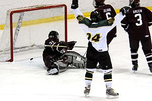 Brockport's Andrew Simmons (24) celebrates one of his team's three goals against Potsdam.