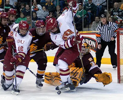 Alex Stalock makes a save amidst traffic in front (photo: Jason Waldowski).