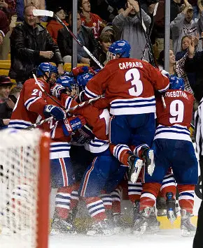 Mass.-Lowell shocked Northeastern with a late goal in regulation and the winner in OT (photos: Melissa Wade).