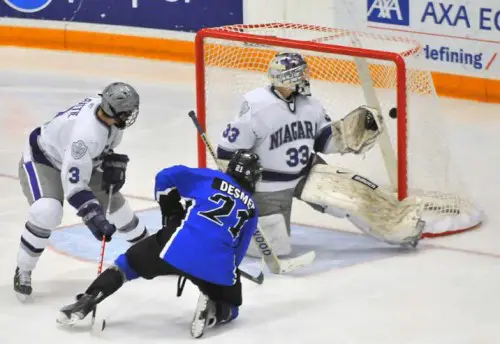 Alabama-Huntsville's Keenan Desmet scores the last goal in CHA history (photo: Doug Eagan).