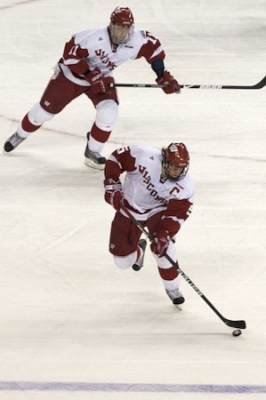 Wisconsin's Blake Geoffrion (front) and Andy Bohmbach were each minus-2 in the national championship game (photo: Jim Rosvold).