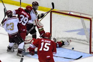 Craig Serino's first period shot caroms over Plattsburgh goaltender Josh Leis and trickles into the net (photo: Angelo Lissuzo). 