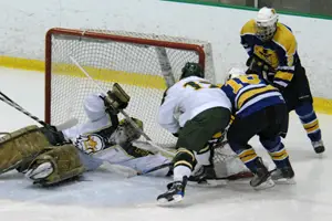 Brockport's Todd Sheridan dives for one of his 33 saves (photo: Angelo Lisuzzo). 