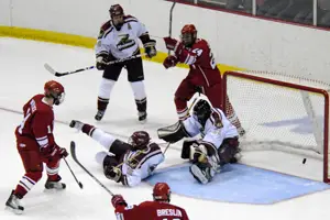 Plattsburgh's Eric Willock finishes off a beautful setup to tie the game 1-1 in the second period (photo: Angelo Lissuzo).