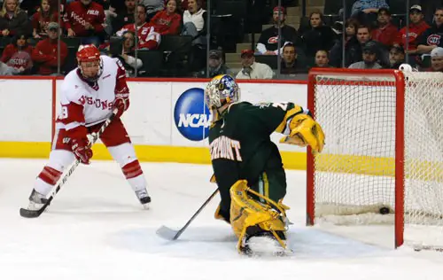 Wisconsin's Michael Davies watches Blake Geoffrion's second-period goal hit the net (photo: Tim Brule).