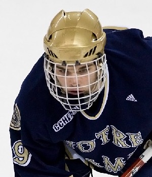 Notre Dame's Ben Ryan and every other college hockey player have to wear full facial protection under NCAA rules, but some say wearing visors could actually help protect players (photo: Melissa Wade).