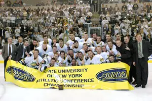 Oswego celebrates the title. Photo by Angelo Lisuzzo.