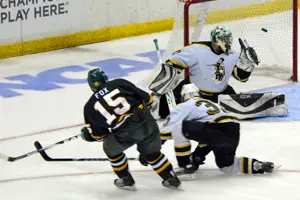 Justin Fox scores for Oswego (photo: Angelo Lisuzzo).