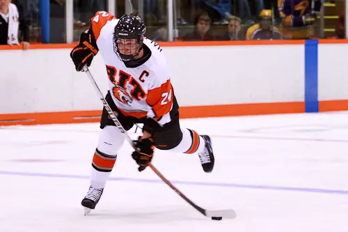 RIT's Chris Haltigin takes a slap shot on Saturday (photo: Dylan Heuer).