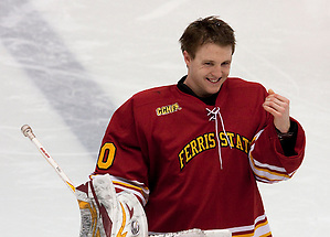 Goalie Pat Nagle smiles at the crowd before the first period. Nagle and the Bulldogs fought off the Michigan State Spartans, winning 1-0 in overtime. . (Erica Treais)