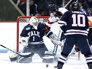 Alec Rush (Princeton - 2) jumps as Rob Kleebaum (Princeton - 39) scores his second goal of the game on goaltender Ryan Rondeau (Yale - 1). Princeton University hosted the Yale Bulldogs at Hobey Baker Rink in Princeton, NJ. After falling to an early 3-0 deficit, the Yale Bulldogs rallied to defeat Princeton 5-4. (Shelley M. Szwast)