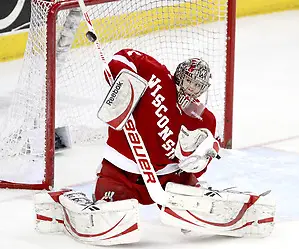 Wisconsin goalie Scott Gudmandson blocks a shot during the third period. No. 16 UNO beat No. 7 Wisconsin 4-3 Saturday night at Qwest Center Omaha. (Photo by Michelle Bishop) (Michelle Bishop)