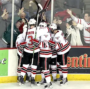 UNO celebrates Rich Purslow's empty-net goal during the third period. Nebraska-Omaha beat Denver 5-2 Friday night at Qwest Center Omaha.  (Photo by Michelle Bishop) (Michelle Bishop)