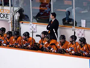 Photo By: Shelley M. Szwast Coach Guy Gadowsky and the Princeton bench watch the action during the first period of their game against Dartmouth. (Shelley M. Szwast)