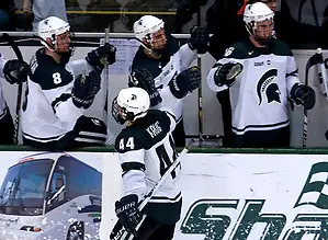 Captain Torey Krug celebrates his hat trick with the Spartan's. The Spartan's beat Michigan in overtime, 4-3. (Erica Treais)