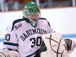 Dartmouth goaltender James Mello makes a save during the first period of their victory over Princeton. Mello faced 35 shots in the game, but held the Tigers to just two goals. (Shelley M. Szwast)