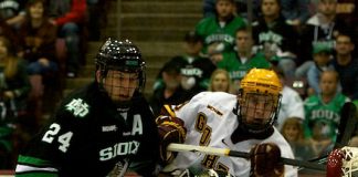 6 Nov 11: Ben Blood (North Dakota 24), Aaron Dell (North Dakota - 32), Erik Haula (Minnesota - 19) The University of Minnesota Golden Gophers host the University of North Dakota Fighting Sioux in a WCHA matchup at Mariucci Arena in Minneapolis, MN. (Jim Rosvold)
