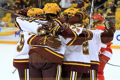 Gopher players celebrate an Amanda Kessel first period goal vs Cornell in the NCAA Semifinal at Amsoil Arena in Duluth, MN (2012 Dave Harwig)