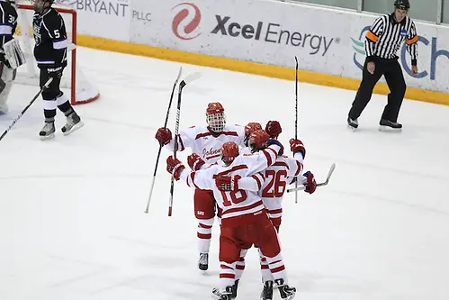 Johnnies celebrate after a goal. Credit: Carina Ezell- College of Saint Benedict. (Tim Brule)