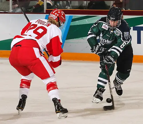 Kaleigh Chippy of Mercyhurst advances on Boston University's Marie-Philip Poulin. (Ryan Coleman/Ryan Coleman, USCHO.com)