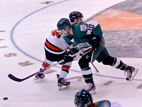 Laura Stacey (Dartmouth - 10) and Gabie Figueroa (Princeton - 21) battle for the puck. (Shelley M. Szwast)