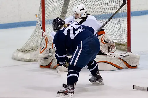 Kate Martini (Yale -25) takes a shot on Kimberley Newell (Princeton -33). (Shelley M. Szwast)