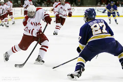 8 DEC 2012: Austin Czarnik (Miami - 7), Matt Bruneteau (LSSU - 27)  The Lake Superior State Lakers shut out the Miami RedHawks 1-0 at Steve Cady Arena in Oxford, OH.  (USCHO - Rachel Lewis) (Tim Brule)