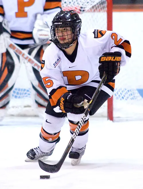Rose Alleva (Princeton - 25) carries the puck out of the defensive zone.  Alleva assisted on Romanchuk's second goal of the game as the Tigers defeated Syracuse 5-0. (Shelley M. Szwast)