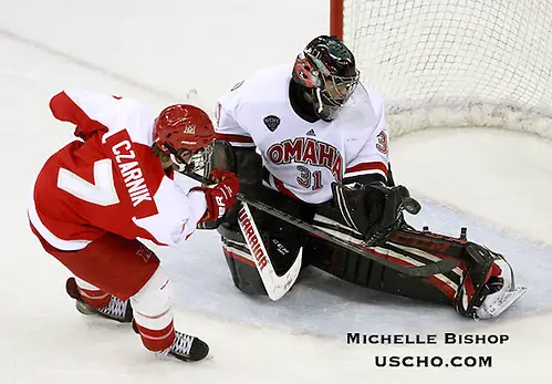 Nebraska-Omaha goalie Ryan Massa stops Miami's Austin Czarnik on a penalty shot. Nebraska-Omaha beat No. 8 Miami 6-3 at the CenturyLink Center in Omaha on Friday. (Photo by Michelle Bishop) (Michelle Bishop)