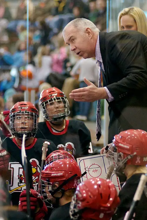 Coach Kevin Houle of Plattsburgh talks with his team (2012 Omar Phillips)