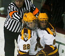 Photo By: Ryan Coleman/Ryan Coleman, d3photography.com Amanda Kessel (22) and Hannah Brandt (8) celebrate Kessel's second goal of the evening and 36th of the year in the Gophers' 5-0 rout of Minnesota-Duluth on February 1, 2013 at Ridder Arena....Unauthorized reproduction of d3photography.com photos is strictly forbidden (resale, reproduction);.use in advertising (for profit or at a loss) is a violation of the Student-Athlete's eligibility to compete...NCAA Bylaw 12.5.2.2 - Use of a Student-Athlete's Name or Picture Without Knowledge or Permission..If a student-athlete's name or picture appears on commercial items (e.g., T-shirts, sweatshirts, serving trays, playing cards, posters) or is used to promote a commercial product sold by an individual or agency without the student-athlete's knowledge or permission, the student-athlete (or the institution acting on behalf of the student-athlete) is required to take steps to stop such an activity in order to retain his or her eligibility for intercollegiate athletics. Such steps are not required in cases in which a student-athlete's photograph is sold by an individual or agency (e.g., private photographer, news agency) for private use. (Revised: 1/11/97, 5/12/05) (Ryan Coleman/Ryan Coleman, d3photography.com)