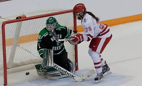 (Erika Sowchuk-25 Wisconsin) (Shelby Amsley-Benzie-1 North Dakota )08 March 13  University of North Dakota and Wisconsin in the  WCHA Final Face Off (BRADLEY K. OLSON)