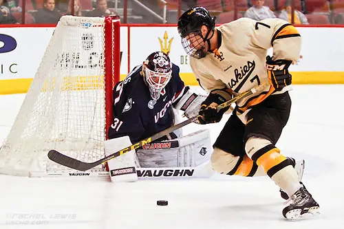 2016Jan08: Rob Nichols (UConn - 31), Reid Sturos (Mich Tech - 7) Game 1 of the Desert Hockey Classic has two Husky teams facing off against one another, UConn and Michigan Tech. 2016Jan08: Rob Nichols (UConn - 31), Reid Sturos (Mich Tech - 7) Game 1 of the Desert Hockey Classic has two Husky teams facing off against one another, UConn and Michigan Tech. (©Rachel Lewis)