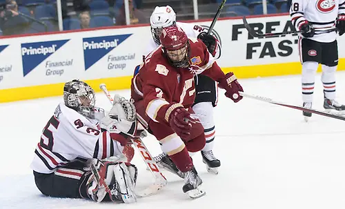 Dylan Gambrell (Denver-7) Charlie Lindgren (SCSU-35) 16 March 18 St. Cloud State University  and Denver University National Collegiate Hockey Conference Tournament match-up at the Target Center in Minneapolis, Minnesota (Bradley K. Olson)